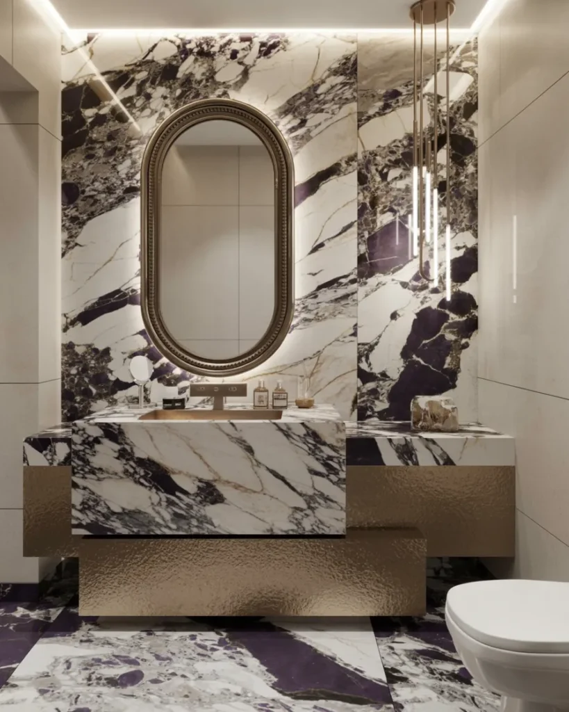 These 25+ Powder Room Ideas Are So Good You'll Want to Redo Yours Tonight 2 Lavish Marble Statement